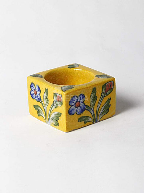 Blue Flower With Green Leaves on Yellow Base